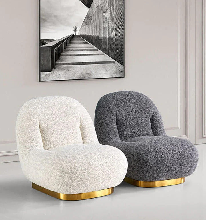 Fauteuil en tissus Bouclette qualité premium traité Anti-tache assise confortable Moelleuse en HR pour les séjours les salon villa ou appartement de luxe maroc Casablanca Rabat magasin de mobilier haute gamme 
