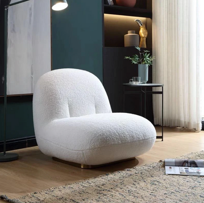 Fauteuil en tissus Bouclette qualité premium traité Anti-tache assise confortable Moelleuse en HR pour les séjours les salon villa ou appartement de luxe magasin de vente de mobilier haut gamme en ligne Maroc a prix pas cher Casablanca Tanger Rabat Marrakech 